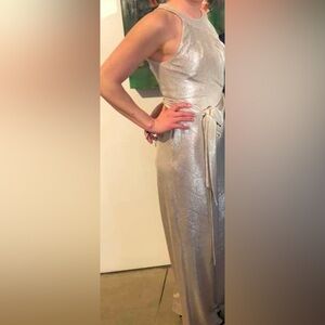 Gently used sparkle cream romper 
Length 40”
High waist 13”